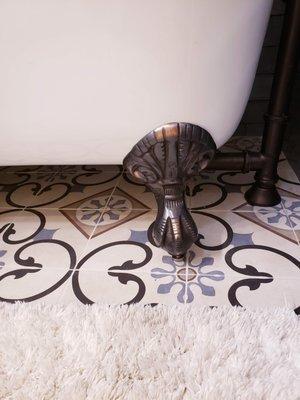 Detail, bathroom redesign. Clawfoot tub, tile, color styling.