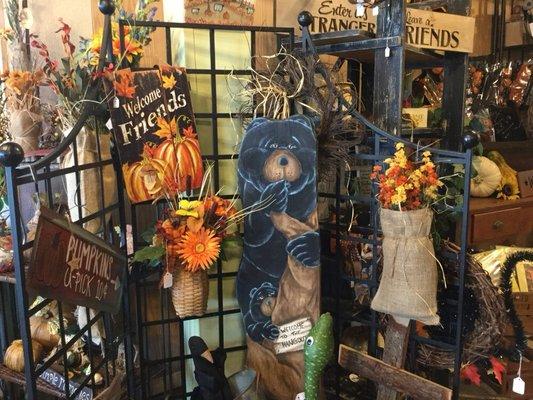 Wooden carvings, wall hangings, and silk wreaths