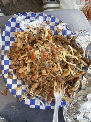 Tacolandia Asada fries at Fresno Swapmeet. Disappointing. It was cold!