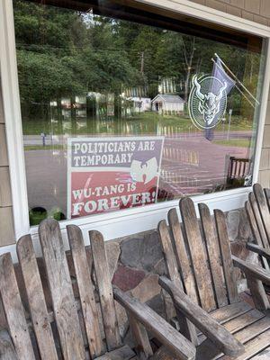 Adirondack chairs on the front porch to enjoy in the shade