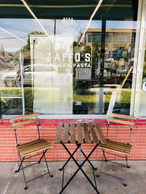 Our outdoor seating in front of ComCom commissary kitchen.