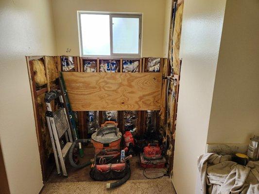 Bathtub and tile removed.