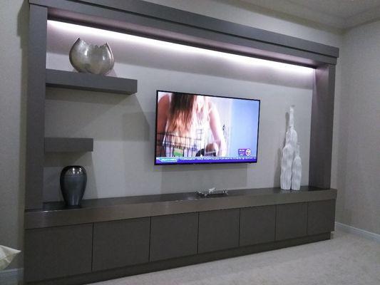 This is a 14' wall unit with  lighting, and a stainless steel top