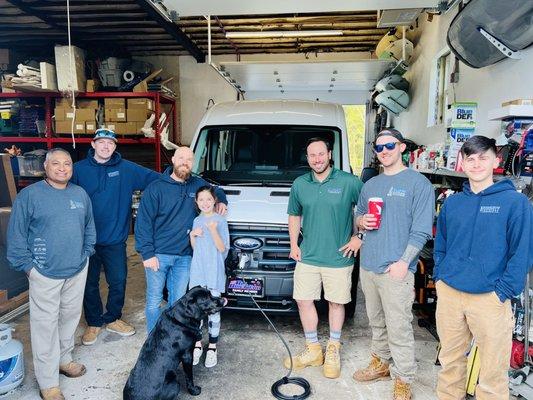 Our Team with our electric truck