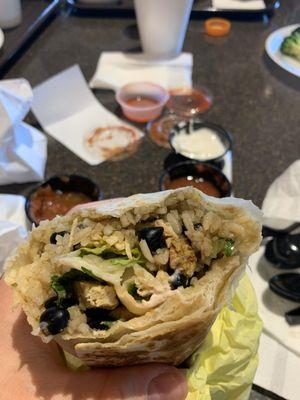 BYO burrito. Chicken, black beans, rice, onion, cilantro, lettuce. Salsa/sour cream on side. Decent but bland. Chipotle is way better!