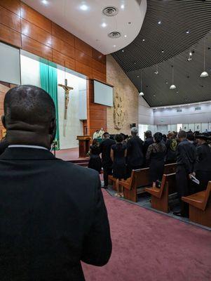 Inside. Mass led by Fathers Sebastian Okoye and Joseph Arulraj.