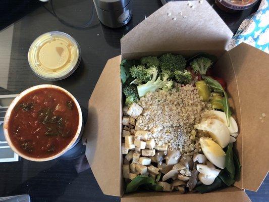 BYO salad with a bunch of things, including tofu, egg, quinoa and broccoli with maple honey mustard dressing and tomato basil soup