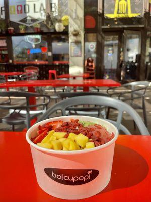 Açaí Bowl with Pitaya and Strawberry Sorbet, Topped with Goji Berries, Mango, Kiwi, and Strawberry Slices