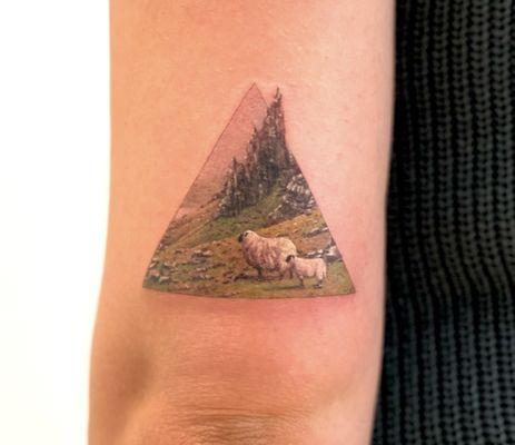 Photo realistic tattoo - Old Man of Storr.