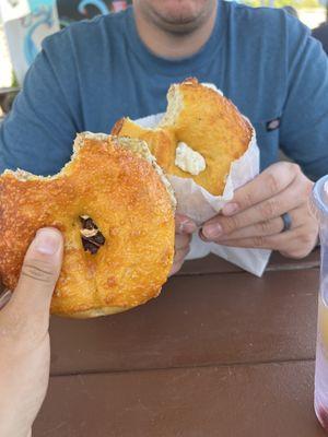 Breakfast bagel (jalapeño cheddar) and cheese bagel with scallion spread