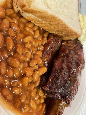 Ribs, baked beans, potato salad and light bread! Delicious