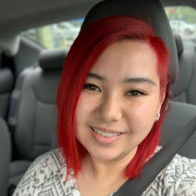 Client selfie with her new red hair.