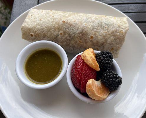 Chorizo Breakfast Burrito with green chile sauce and Fresh Fruit