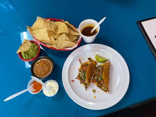 Yumm....best seller! Borris Tacos with an order of chips and salsa, guacamole and sour cream