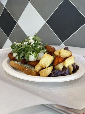 Fried Chicken Benedict - sous vide eggs, dressed arugula salad, crisp rainbow potato medley, open-faced texas toast