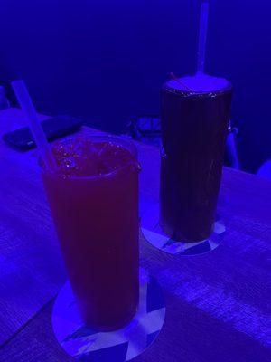 Nonalcoholic fruity drink and a Paradise Rum Punch