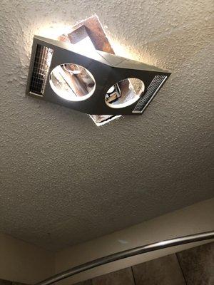 Broken light fixtures throughout the room