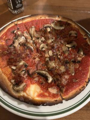 Gluten-free pizza with mushrooms and bacon