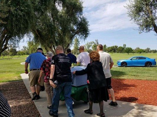 Ruth Akes at the end of the casket with my son, Jason, to the left of her and myself in front of my son, along with friends and family.