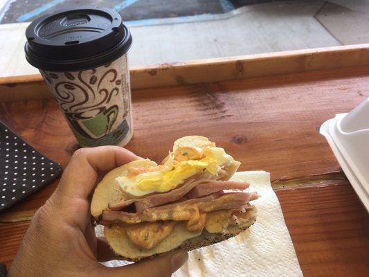 Breakfast Bagel w Ham, Egg and Sun-dried Tomato Cream Cheese. So worth the mess! Yum!