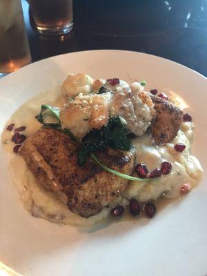 Mahi-mahi over mashed potatoes, spinach, shrimp and a lemon pomegranate sauce ! Absolutely delicious!