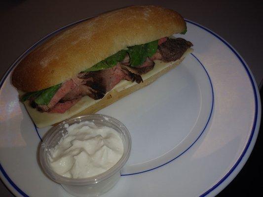 Tri Tip sandwich with a side of horseradish sauce