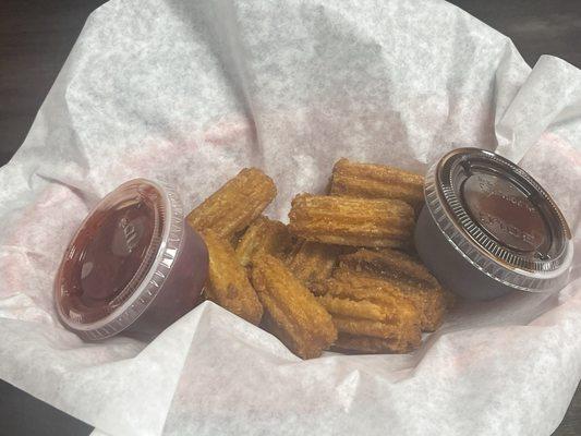 churros with Hershey sauce and strawberry compote