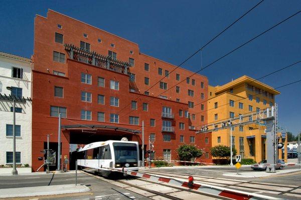 Exterior Building and Gold Line Train