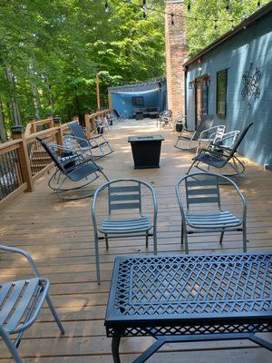 Lots of space to lounge outside on the deck and patio