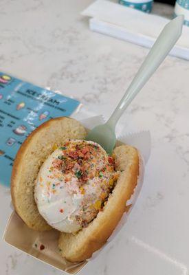 Check out the top view of the stuffed donut with fruity pebbles ice cream