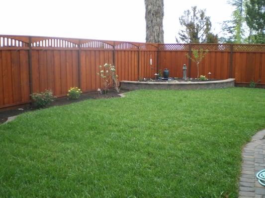 A &J Fencing Concord, CA
 Redwood fence with arch piano key lattice