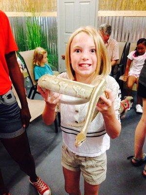 A gorgeous snake with Kristen when she was younger.