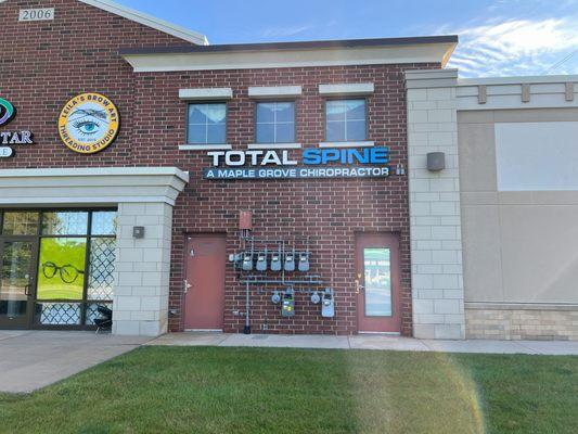 Total Spine signage on Bass Lake Road