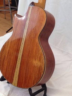 Rear of Sangho's first guitar. Asian Rosewood with blue abalone backstrip. Finished with French polish.