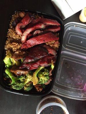 Lunch combo with ribs, beef and broccoli, and pork fried rice. SO much food.