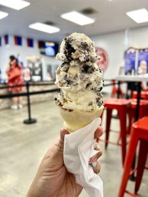 Oreo cheesecake and ice cream in a small cake cone (large scoops)