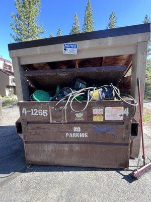 Disposal of their commercial waste in dumpsters in a condo complex after doing work at private residences.