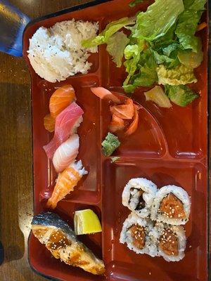 Bento with spicy tuna roll, teriyaki salmon, and mixed sushi