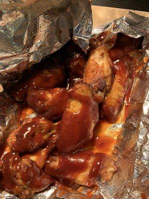 Meaty, bland wings, heavily sauced (bbq.)