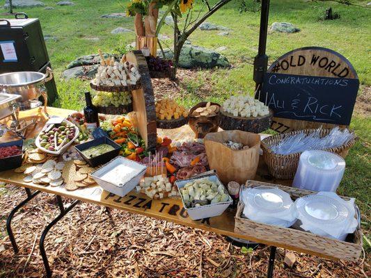 Charcuterie Table by Old world pizza truck.