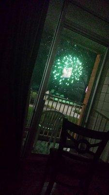 Laying in my bed at the Seahawk, watching the fireworks.