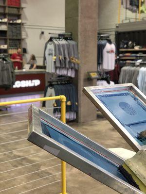 Welcome to Flagship. Live screen-printing, quality apparel and a unique store atmosphere!