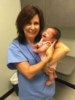 Ignore my daughter..I just needed a photo of her & her amazing Dr. who delivered her! We love Dr. Langdon!