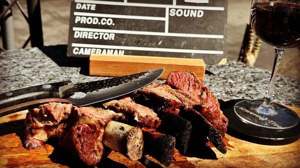 Savage and fantastically delish BBQ short ribs  created on a rustic grill - experience the magic of short rib BBQ heaven!