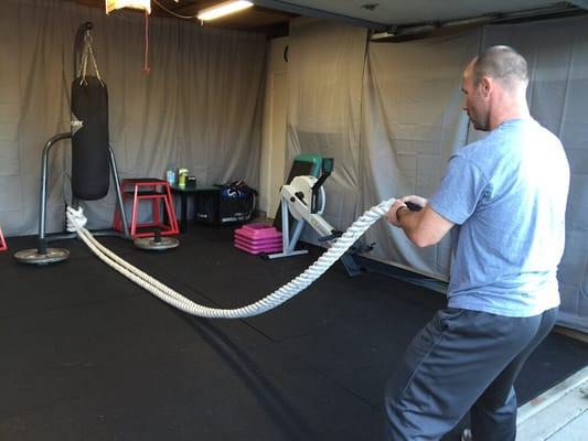 Rope slams. Many variations can be done and many things can be added to it like lunges.