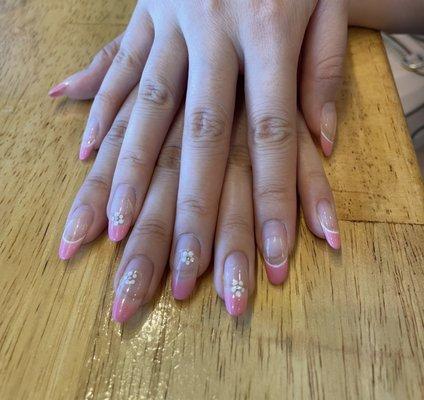 gel manicure (pink tips) with floral designs after 1.5 (almost 2) months --no chips or fallen gems!! my manicures last for so long.