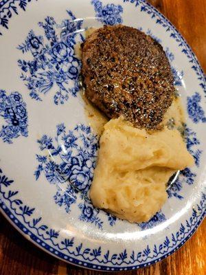 Hamburger steak with mashed potatoes.