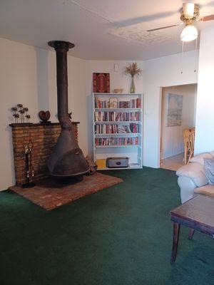 Wood burning fireplace in living room