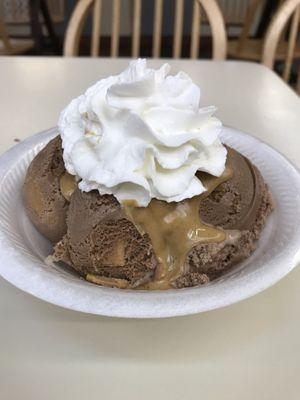 Chocolate peanut butter ice cream with peanut butter drizzle