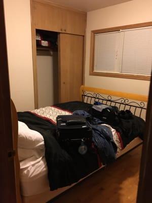 Queen sized bed with a full sized closet (with extra pillows) is just one of the two full sized guest rooms.